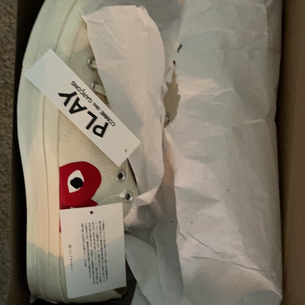 Brand new Comme de Garçon Converses.